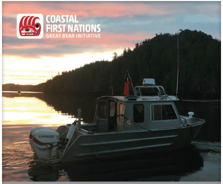 An image of a coastal guardian boat in the water with a sunset.